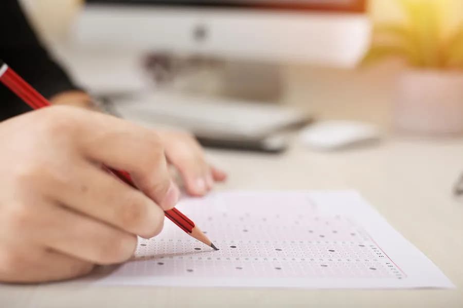 Pencil marking a real OMR answer sheet